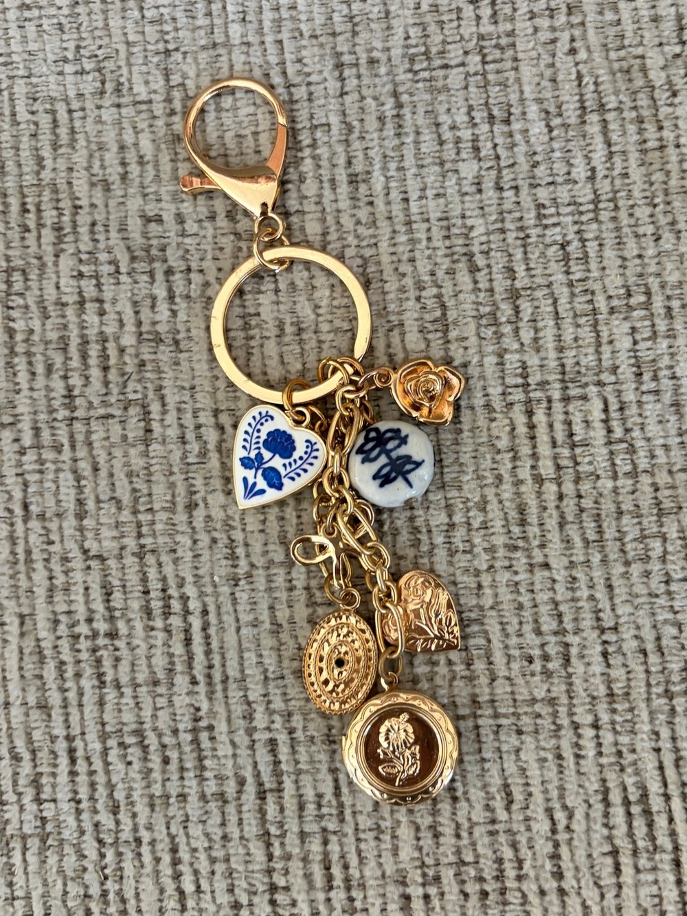 Gold-Tone Floral Bag Charm Keychain with Blue Porcelain Accents